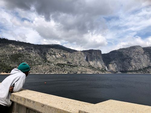 student looking at ocean