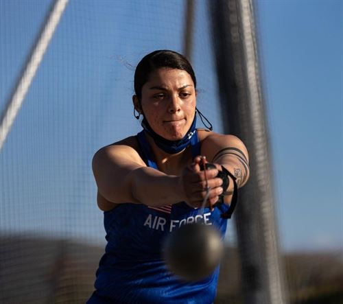Student doing shotput