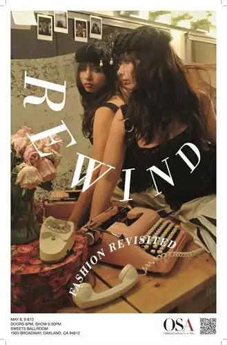 Student sitting on table looking into mirror