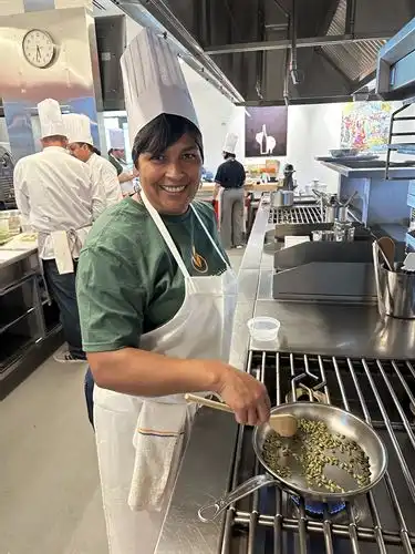 Carmen cooking pepitas