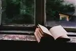 book on window sill
