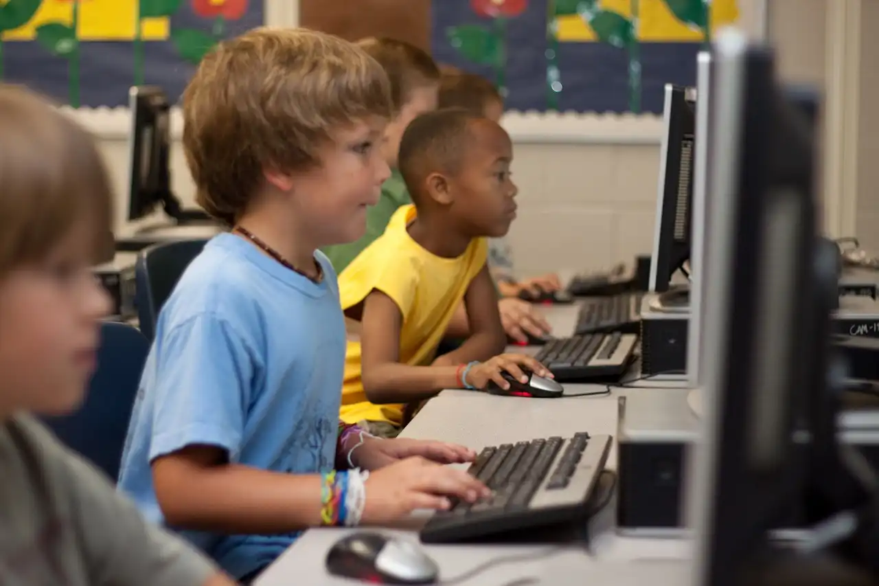 students working on computer