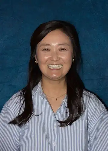 kim with blue background