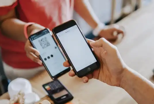 Person scanning a QR code