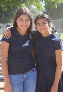 Two girls smiling