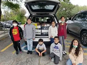 Students with donated goods.