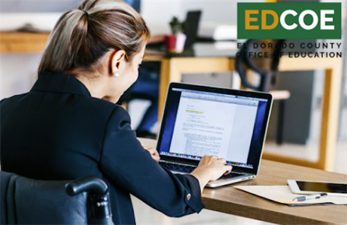 employee at laptop