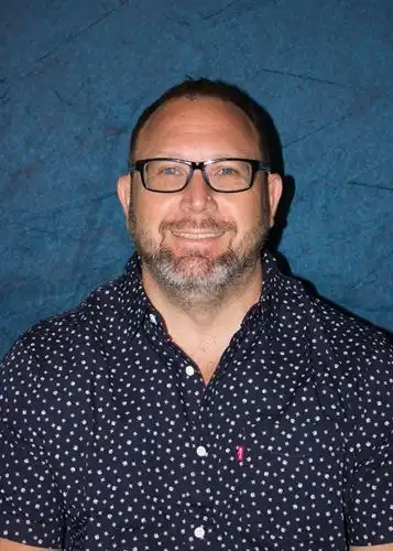 moore with blue background