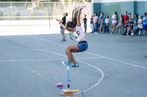 Student and stomp rocket at Enrichment Academy