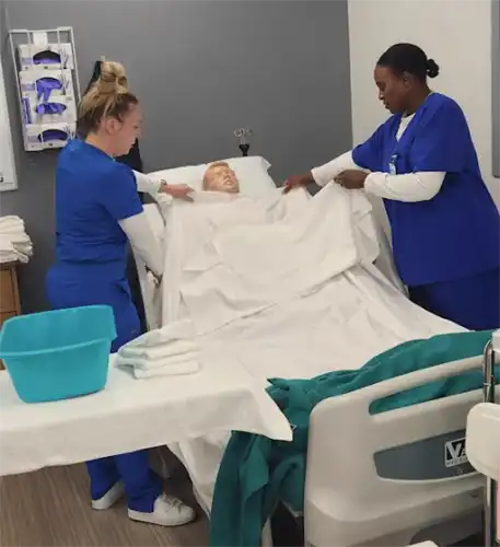CNA students get hands on practice in the classroom