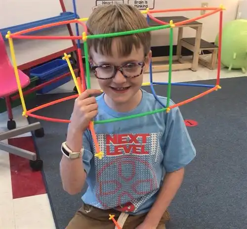 Child playing with shapes