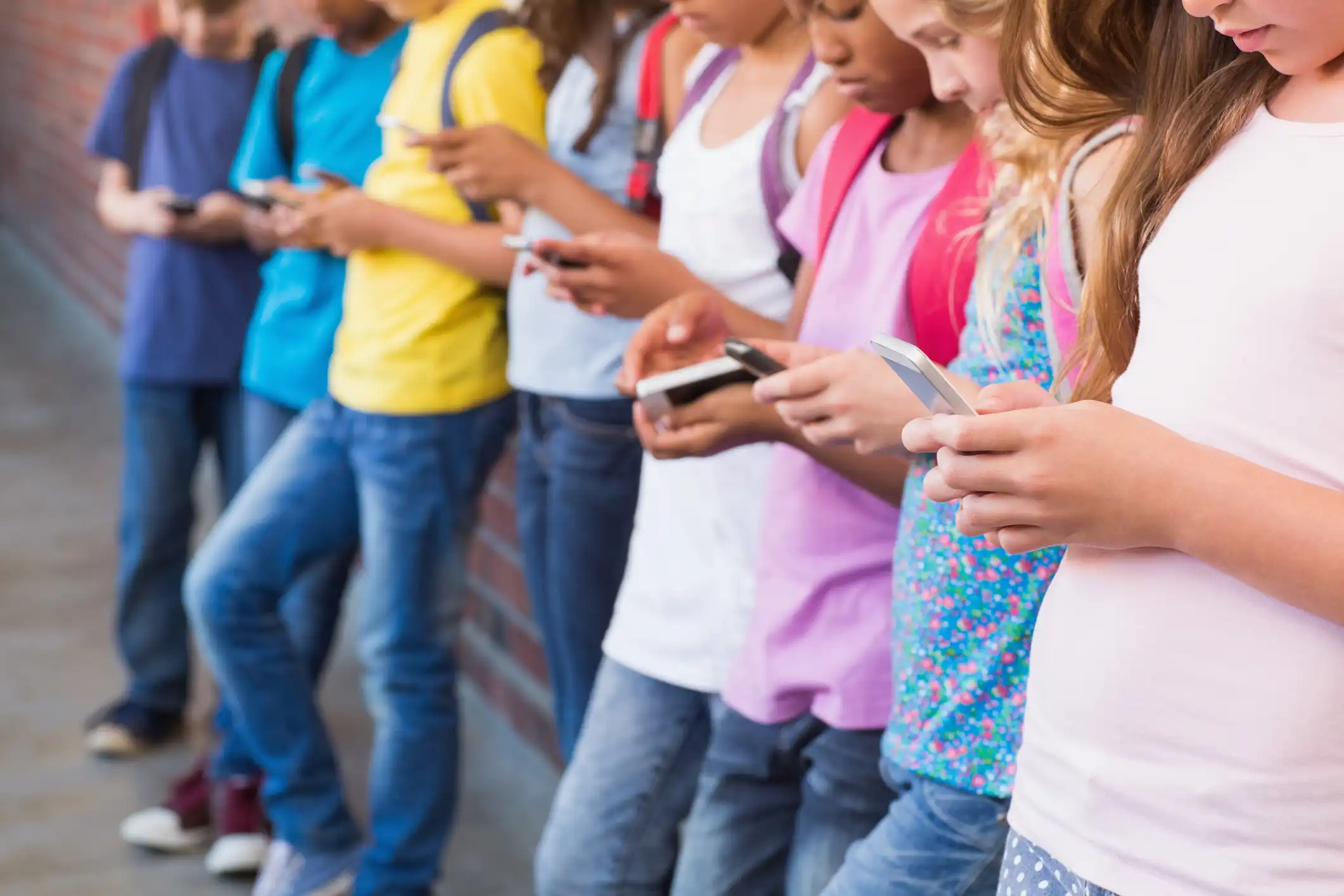 Student using their cellphones.