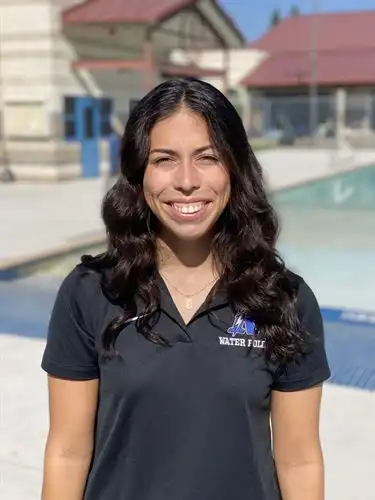 Coach Julia smiling