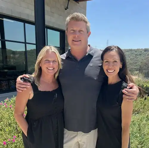 Torrey Hills' 5th grade teachers: Mrs. Mullins, Mr. Wilken, and Mrs. Wilson standing in front of a classroom at Pacific Sky School