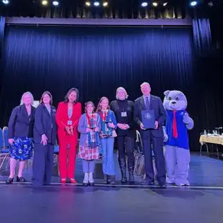 2025 spelling Bee elementary school winners with judges