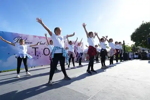 kids performing on stage
