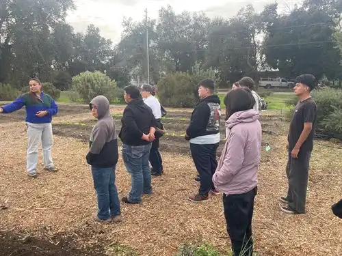 Students learning about crops on field trip