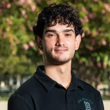 Male student profile picture wearing black pholo shirt with BHS's school emblem.