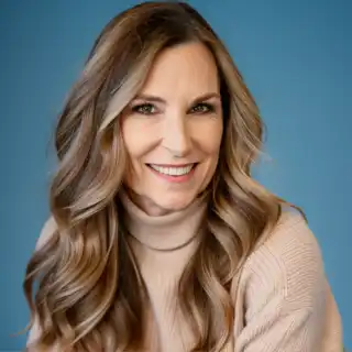 Jolene Church portrait with blue background