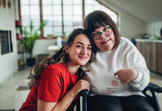 Teacher With Special Needs Student in Wheelchair