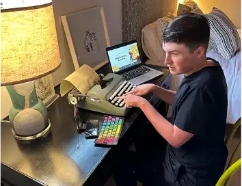 Otto Lana getting his thoughts out in several ways.