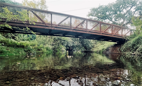 Photo of bridge over creek.
