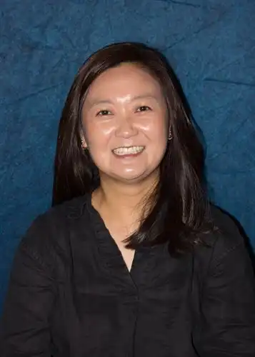 kim in black blouse