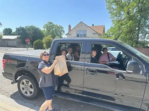 truck picking up bags