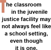 The classroom in the juvenile justice facility may not always feel like a school setting, even though it is one.