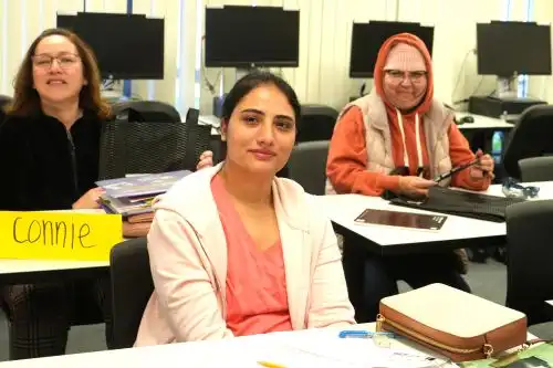 ESL Students in an Adult Education Classroom with Computers