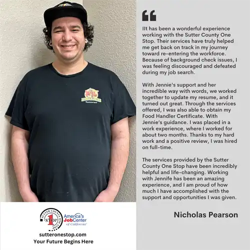 A man wearing a hat standing with his hands in his pockets. 