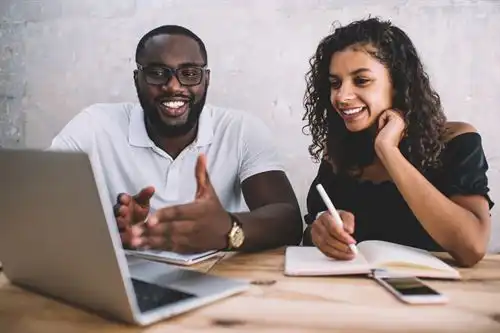 two people at computer