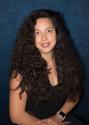 Jackie in a black shirt