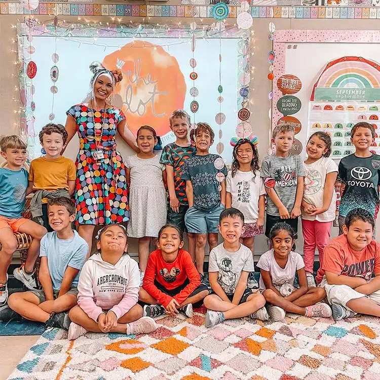 teacher and kids smiling