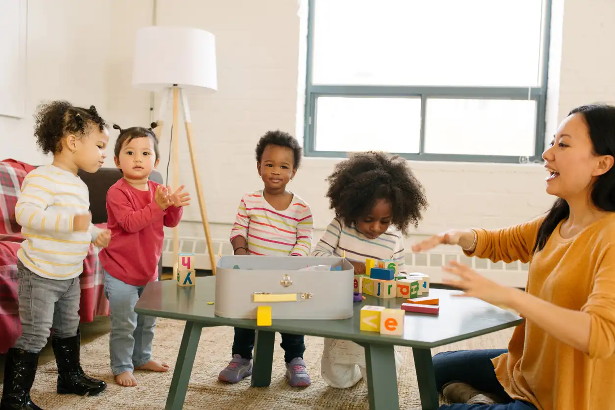 teacher and students playing