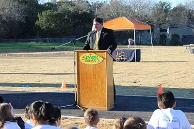 Dr. Gottardy speaks at the opening of the SPARK at Hidden Forest Elementary School 