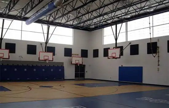Elementary School gymnasium floor with enhanced safety and fall protection properties