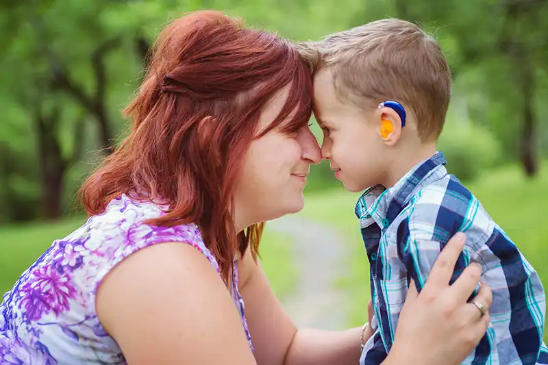 Mom and son touching noses